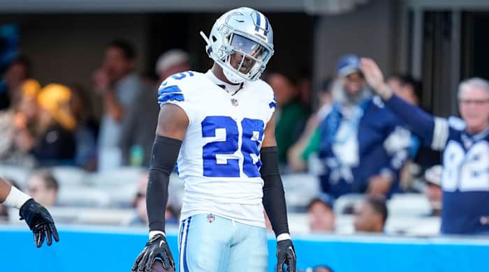 Cowboys CB DaRon Bland celebrates after scoring on a pick-six